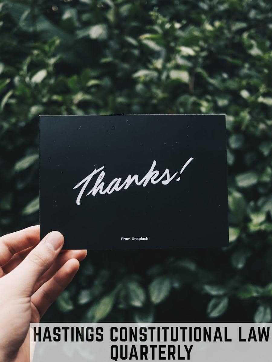 person holding Thanks card