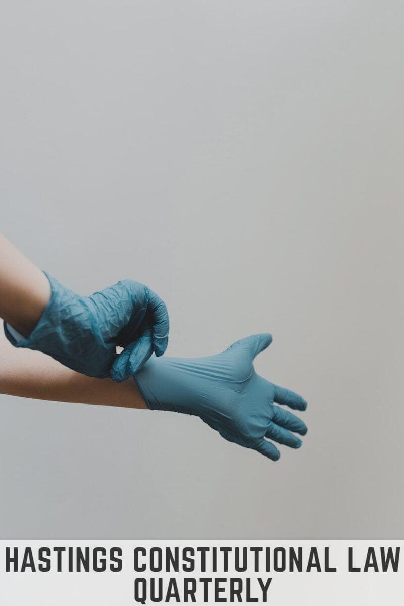 person in blue gloves and blue denim jeans